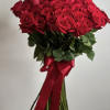 Bouquet of red roses tied with a red satin ribbon