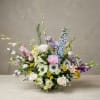 A lush, elegant, and grand floral centerpiece beautifully crafted for first birthday