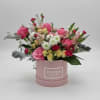 This enchanting mix features the classic beauty of pink roses, charming yellow