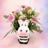Sweet, whimsical, and full of countryside charm, Pastel Pastures is arranged in