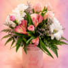 Send a little sunshine with Bloom &amp; Brighten, a cheerful garden-style arrangement