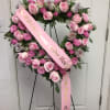 Add a meaningful finishing touch to your sympathy tribute with a custom