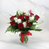 Make every occasion unforgettable with our Crimson Elegance Bouquet, a timeless arrangement