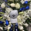 This Standing Spray pays tribute to a devoted football enthusiast with fresh