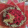 16 RED ROSES BEAUTIFULLY WRAPPED IN ANY COLOR PAPER PREFERED 