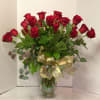 24 RED ROSES, WITH GREENS &amp; FILLER FLOWERS. ARRANGED IN A CUSTOM