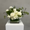 Elegant and timeless, Lumi&egrave;re is a luxurious white flower arrangement designed with