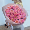 Large bouquet of pink roses wrapped in blush paper