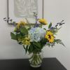 Welcome home a sweet baby boy with this bright and sunny arrangement.