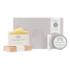 Self-care gift box with a candle, balm, and soap bar