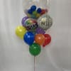 Cluster of colorful birthday balloons with two printed foil balloons