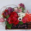 A little garden of white french anemones, pink spray roses, red roses