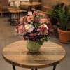 This is a silk arrangement, meaning artificial, not real flowers. This arrangement