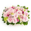 Low rectangular arrangement of pale pink roses, green hydrangeas, and pink blooms in a compact design