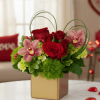 A Golden cube with red roses and orchids - for the pure