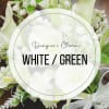 White and green floral arrangement with calla lilies and small white blooms