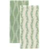 Two green patterned wrapping papers with fern-like designs