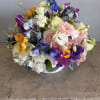 Pamper her with a grand display of lush seasonal blooms. A variety