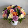 The CARNIVAL bouquet features a beautiful variety Roses in shades of peach