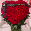 stunning heart-shaped arrangement crafted with 130 premium red roses, carefully selected to