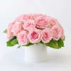 Pink rose bouquet in a white vase