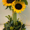Topiary constructed of Sunflowers, Roses &amp; Assorted  Greens.
Note:   There