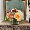 Just sit back and enjoy all the beautiful autumn colors this arrangement