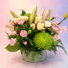 Elegant and effortlessly refined, Whispering Grace is a lush garden-style arrangement featuring