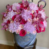 Luxurious mix of premium roses, orchids and chrysanthemums in our Velvet Signature