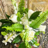 White floral bouquet with roses and green fern fronds