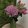 "Purple Majesty" exudes opulence and sophistication.  Rich purple roses and elegant