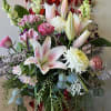 A showstopping and passionate arrangement, in various shades of pinks. 

*Flowers Subject