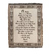 Fringed wall hanging with the Lord's Prayer printed in the center