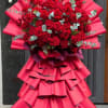 An oversized standing bouquet that reads like a celebration: the Grand Success