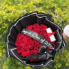 A timeless graduation bouquet featuring premium 25 red roses, elegant black wrapping