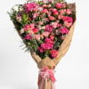 A lush cascade of pinks that reads like a hand-picked garden -
