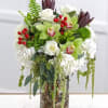 Lovely green and white flowers practically burst out of this nature inspired