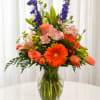 Bright, lively, and unapologetically joyful - this mixed-color flower arrangement makes a