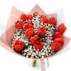 Premium hand-tied bouquet featuring lush tulips paired with baby&rsquo;s breath.Perfect for any