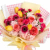 A cheerful hand tied bouquet featuring garden roses, tulips, gerbera ,and carnations.Perfect