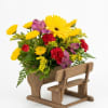 Celebrate the educators who help our children grow! This thoughtful arrangement features