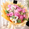 Elegant hand-tied bouquet featuring 10 pink peonies and 10 pink tulips, beautifully
