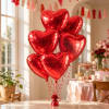 Celebrate love and romance with a beautiful bouquet of heart-shaped foil balloons.