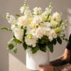 A lush, garden-fresh arrangement that reads airy and elegant-Miami Beach Vibe is