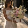 Soft white and blush petals unfurl like a warm evening breeze in