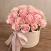 A floral box designed in soft pink tones, creating a light and