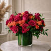 Velvet Ember is a striking luxury rose arrangement designed to make an