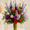 Colorful mixed bouquet in a clear glass vase