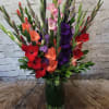 Someone will be "glad" to receive this towering assortment of vibrant gladiolus