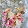 Pink and peach bouquet with lilies, roses, and gerbera daisies